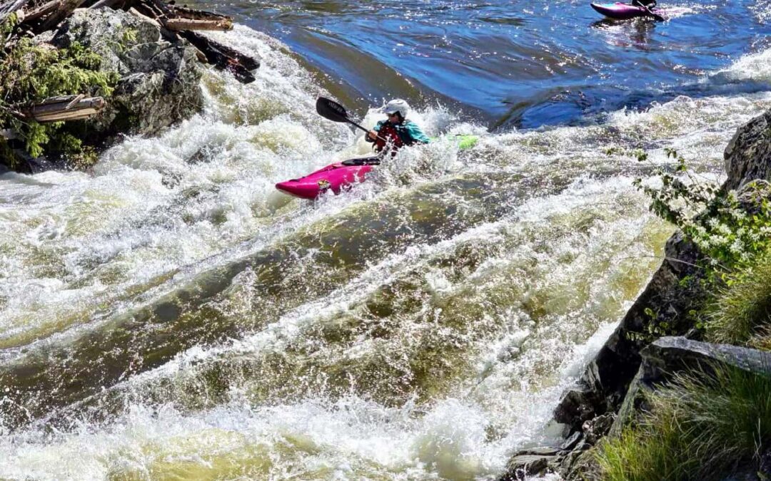 going through a rapid on the middle fork on the salmon river in a kayak