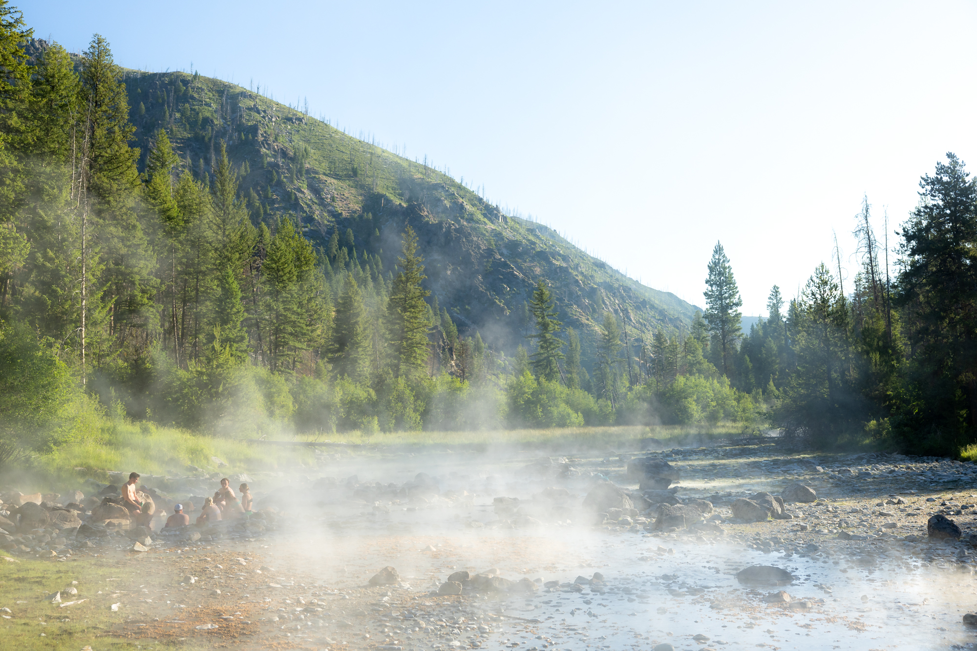 a group soaks in the hot springs on the middle fork salmon river